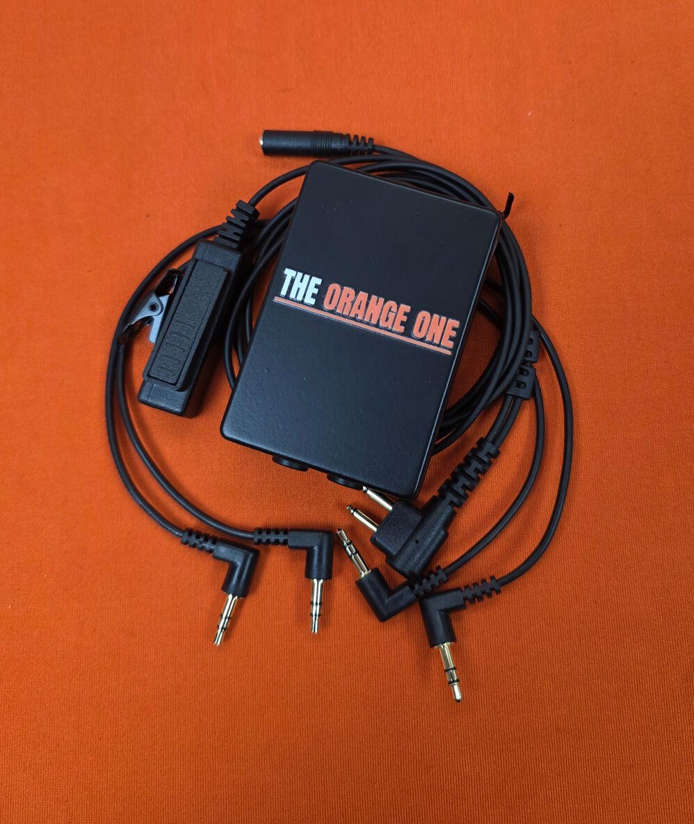 The Orange One with a Walkie-talkie cable